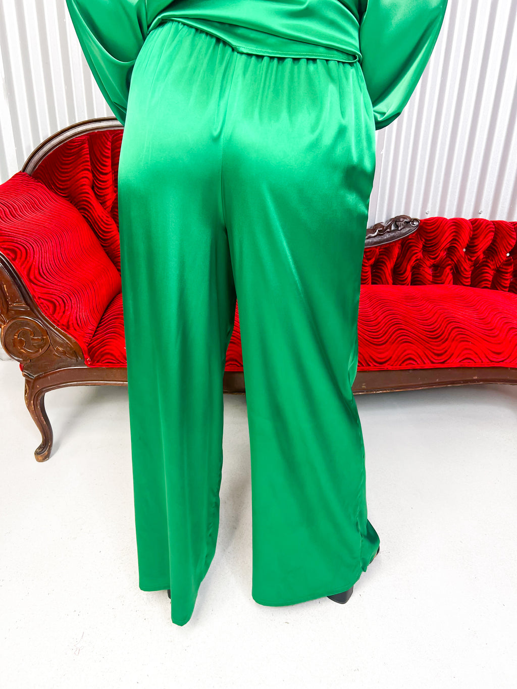 Green satin wide leg pants with high waist.