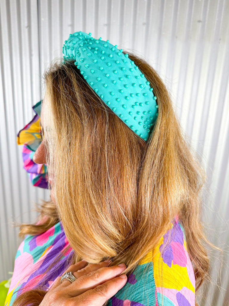 Shop women's hair accessories including this turquoise, beaded headband.