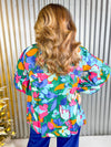Pink, blue, and orange floral print long sleeve blouse.