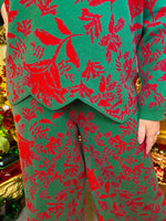 Two-piece long sleeve sweater set in red and green lily print, perfect for Christmas.