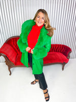 Green pleather coat with removable fur collar and cuffs. 