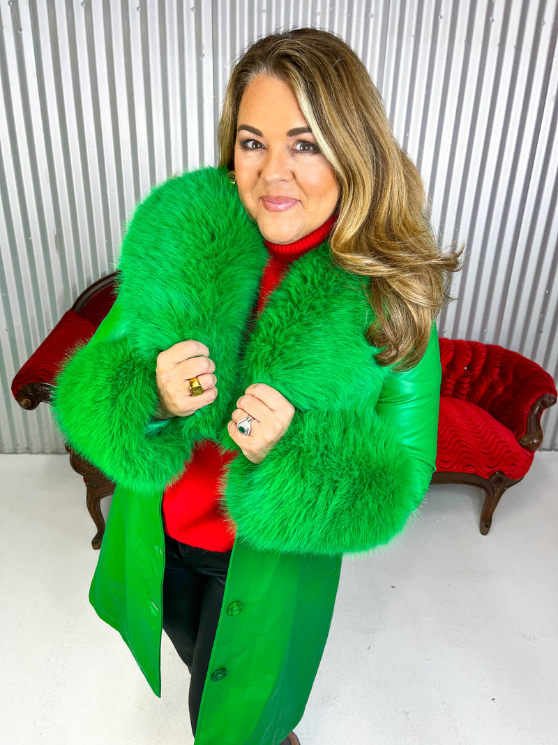 Green pleather coat with removable fur collar and cuffs. 