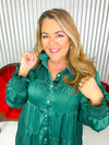 Women’s green tiered dress with rhinestone detail. 