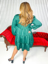 Women’s green tiered dress with rhinestone detail. 