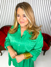 Green satin button down shirt dress with rhinestone detail. 