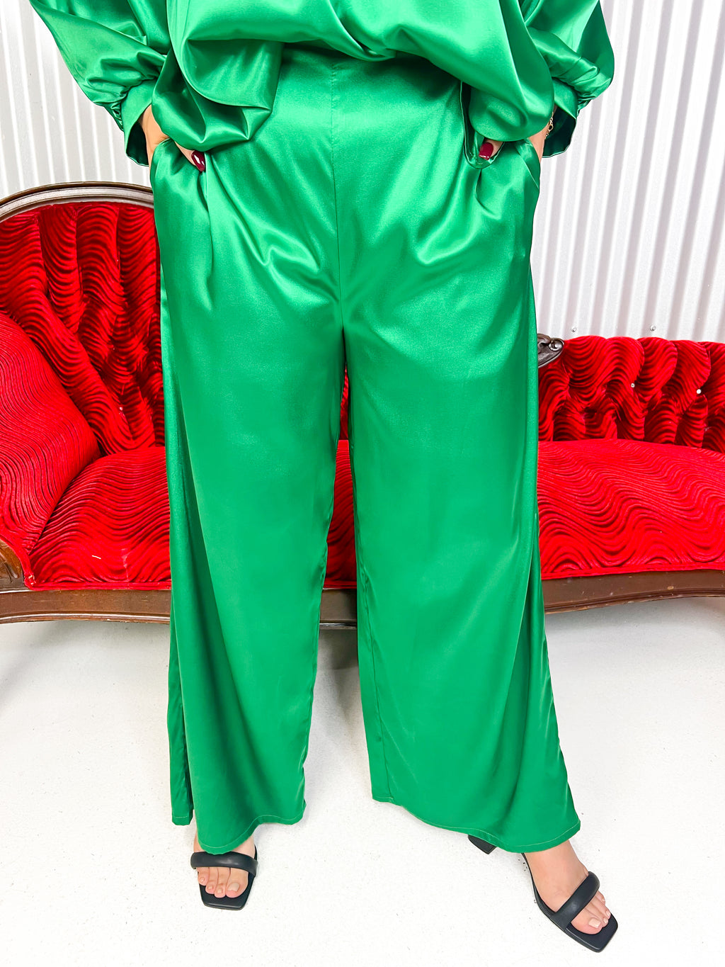 Green satin wide leg pants with high waist. 