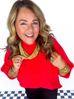 Winning In Red Sweater Top