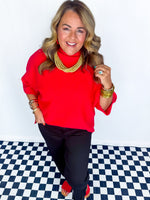 Winning In Red Sweater Top